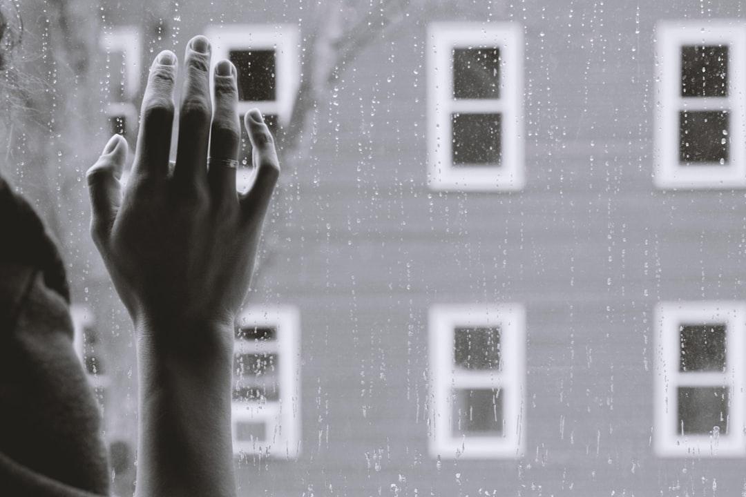 Grayscale photo of woman right hand on glass from Kristina Tripkovic on Unsplash Sức khoẻ và cuộc sống tình dục