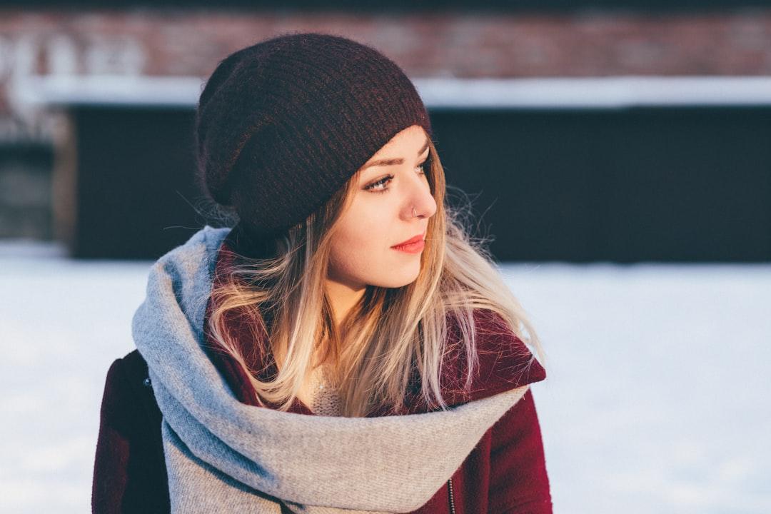 Woman wearing black knitted cap from freestocks on Unsplash