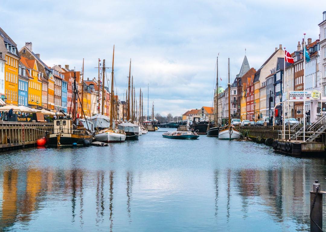 Boats in canal in denmark during daytime from Ava Coploff on Unsplash