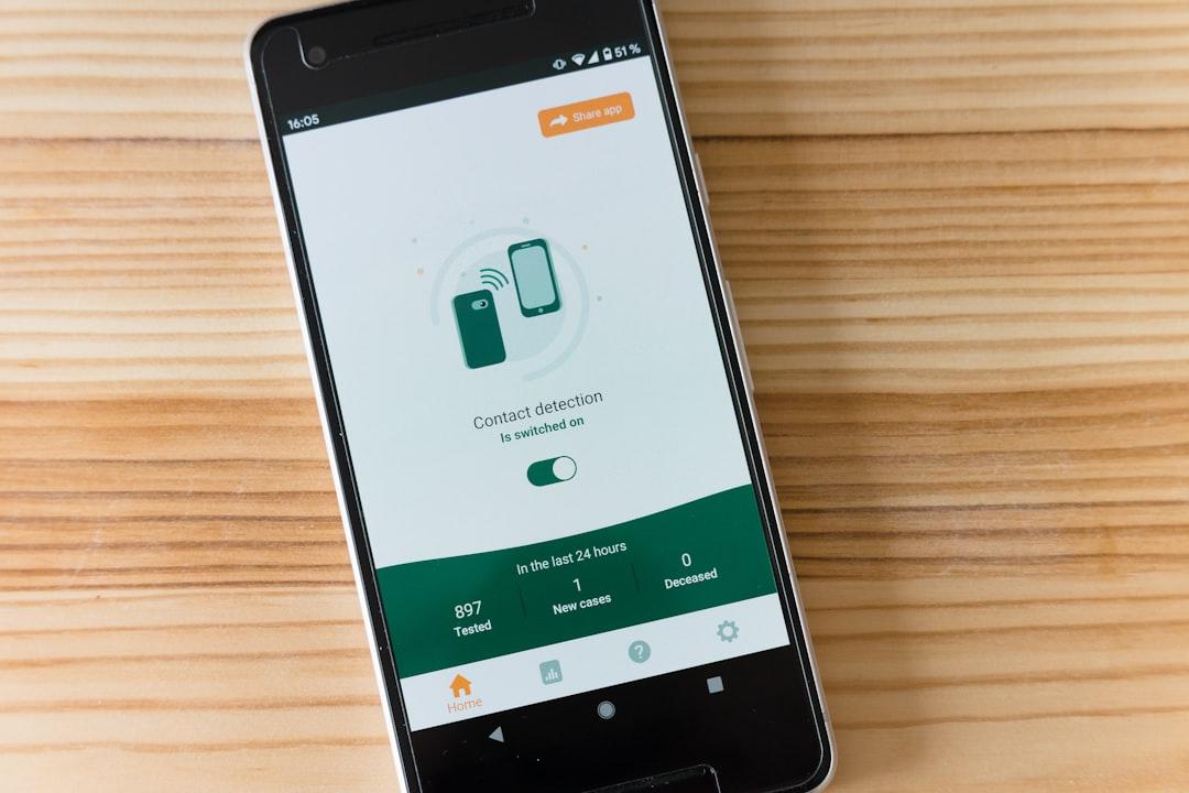 Black samsung android smartphone on brown wooden table from Markus Winkler on Unsplash