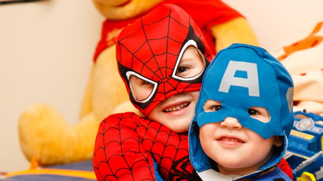 Kids in spiderman and captain america costumes from Steven Libralon on Unsplash