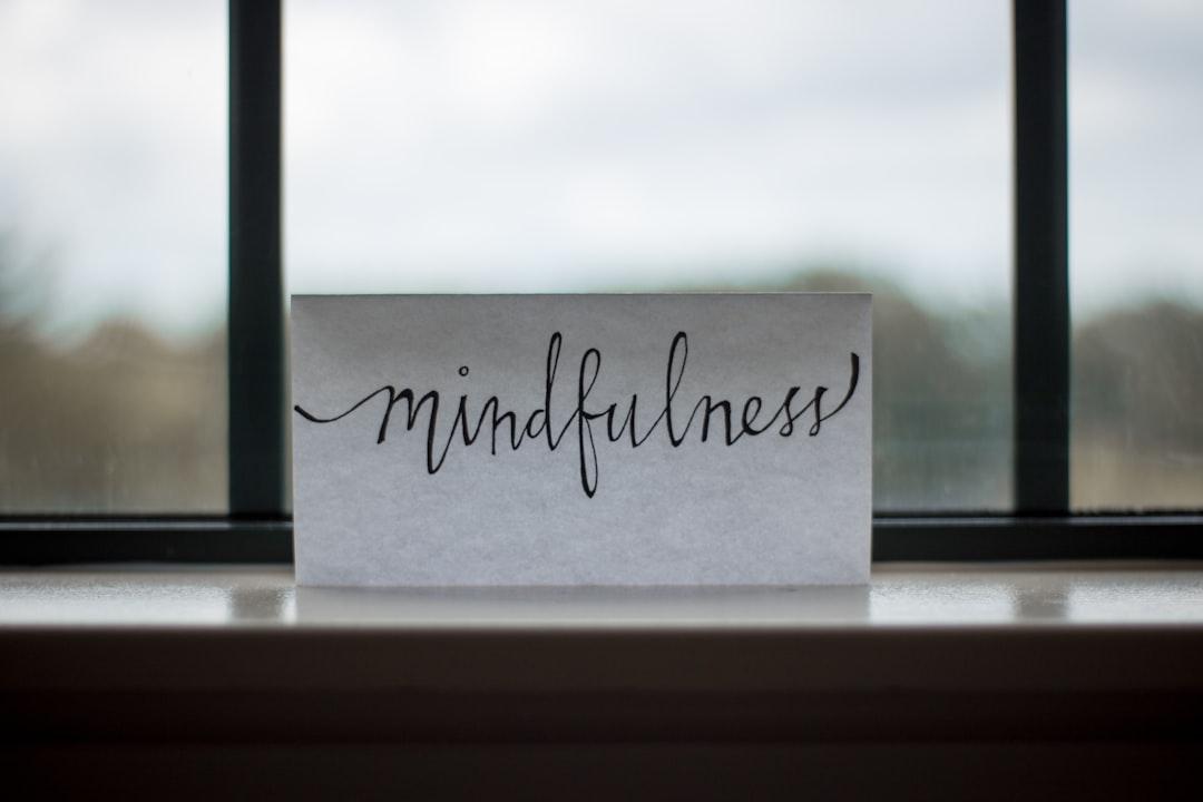 Mindfulness printed paper near window from Lesly Juarez on Unsplash