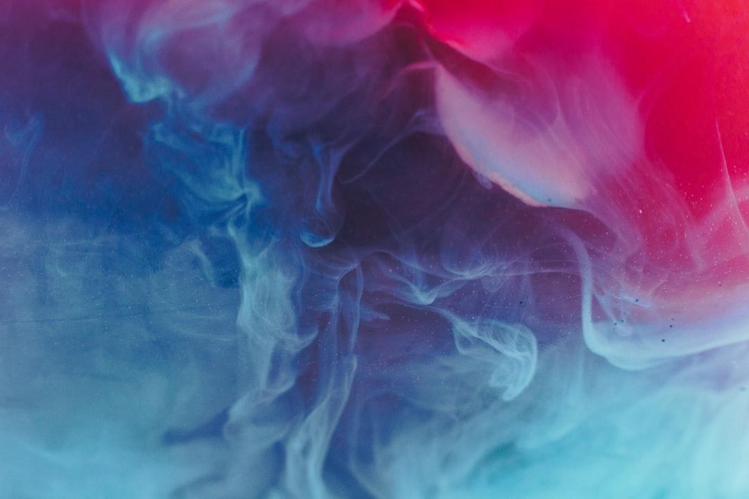 Red and gray smoke bomb from Ruvim Noga on Unsplash