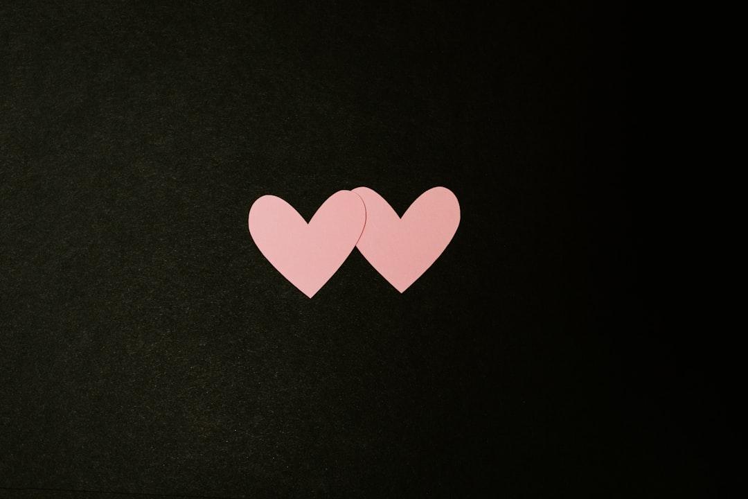 Black and white heart print textile from Kelly Sikkema on Unsplash