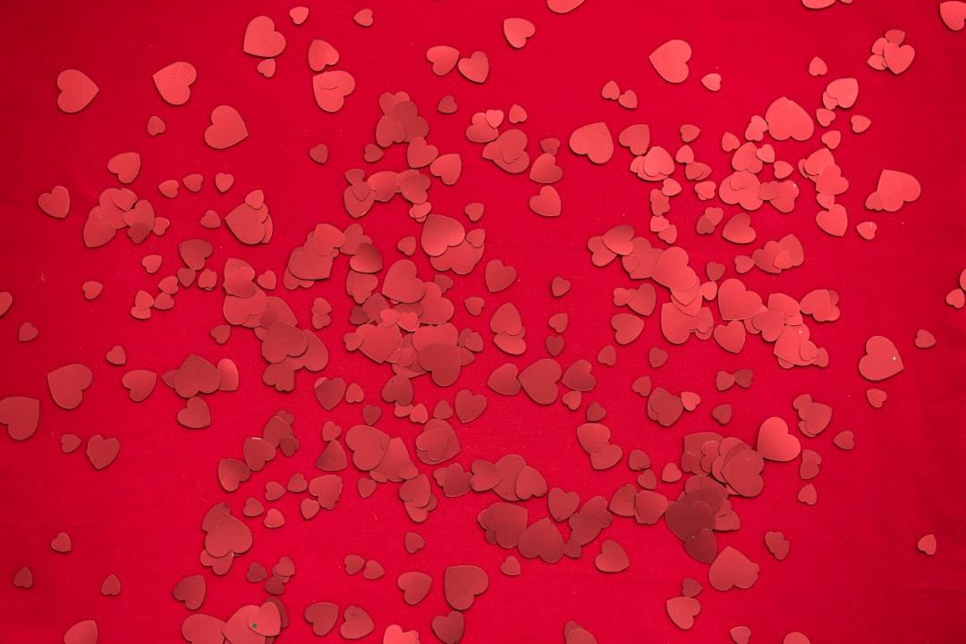 Red heart sticker digital wallpaper from Joanna Kosinska on Unsplash
