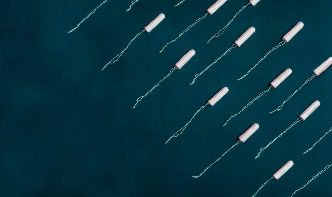 White strings on blue surface from Josefin on Unsplash