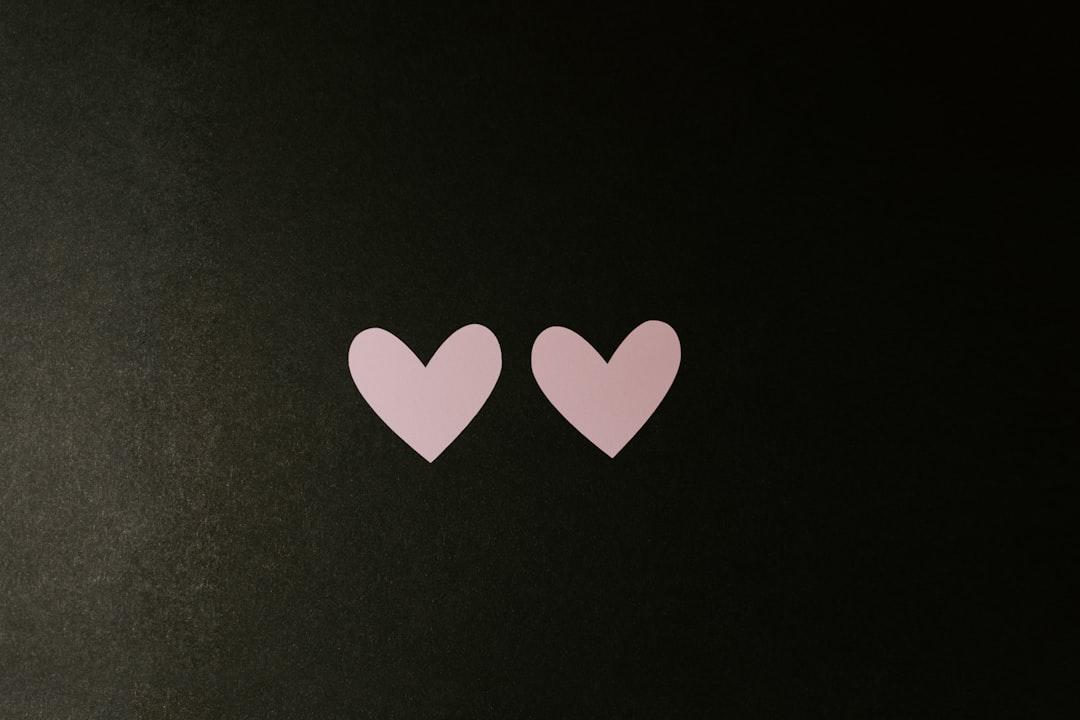 Black and white heart print textile from Kelly Sikkema on Unsplash