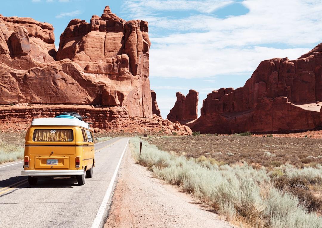 Yellow volkswagen van on road from Dino Reichmuth on Unsplash