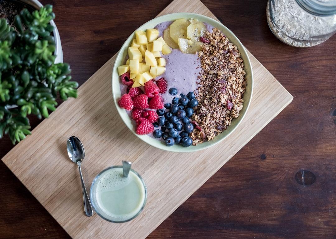 Flat lay photography of fruits on plate from Jannis Brandt on Unsplash