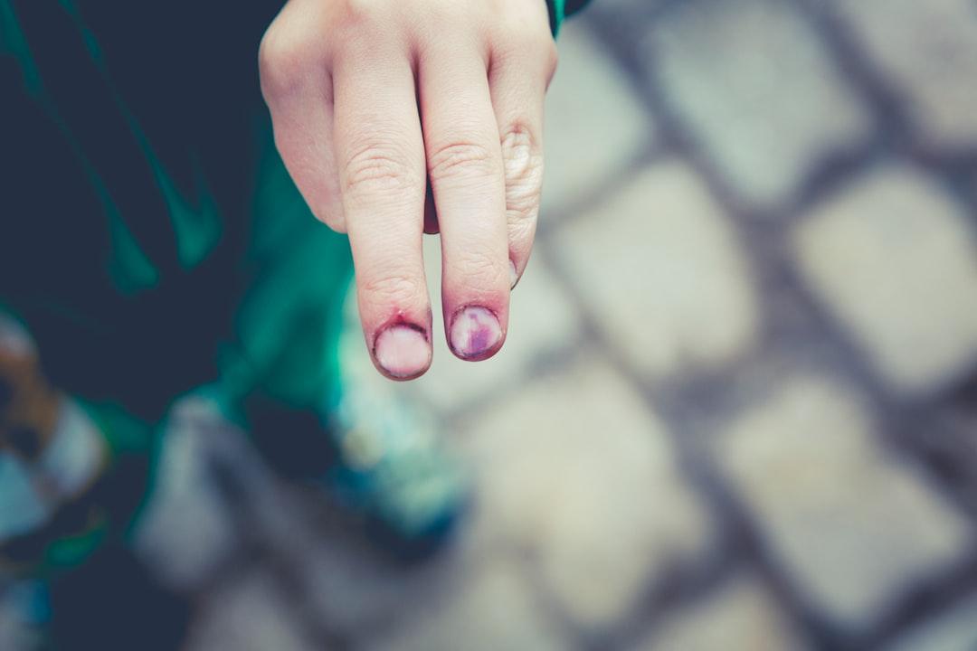 Person point two fingers forward from Markus Spiske on Unsplash