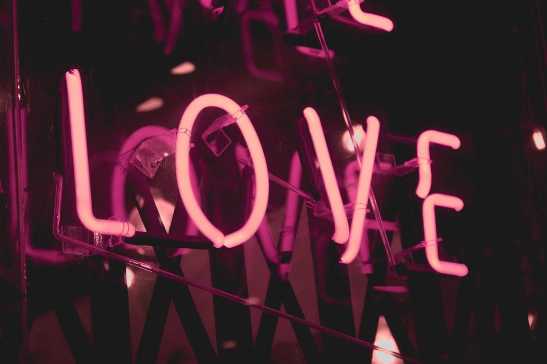 Pink love neon signage from Shaira Dela Peña on Unsplash