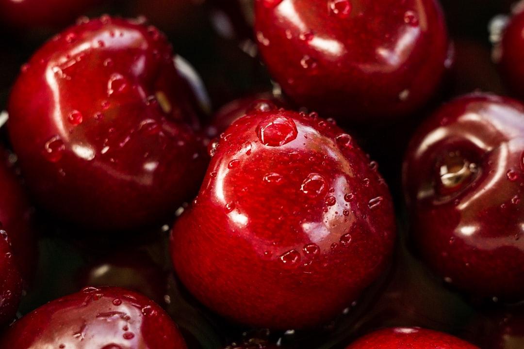 Closeup photography of red cherry from Roksolana Zasiadko on Unsplash