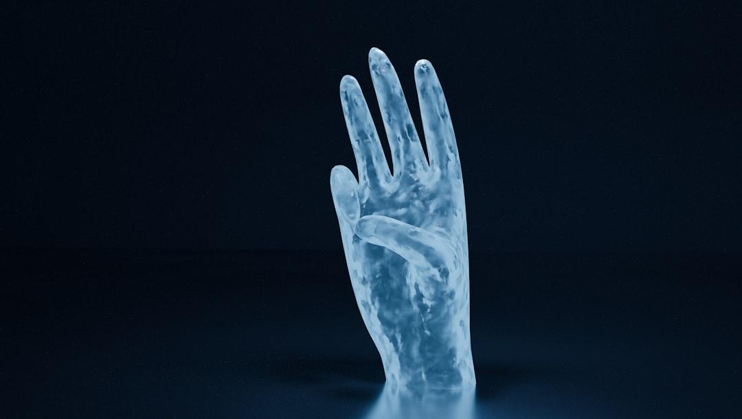 Human hand with white background from Enchax Creative on Unsplash