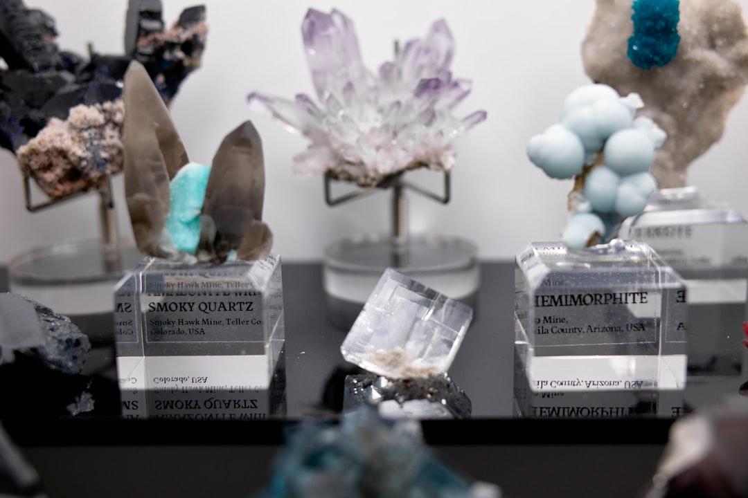 A group of crystals sitting on top of a table from Takemaru Hirai on Unsplash